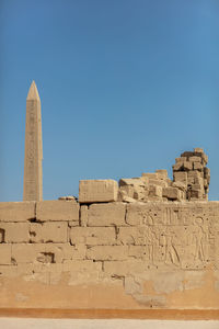 Different hieroglyphs on the walls and columns in the karnak temple.