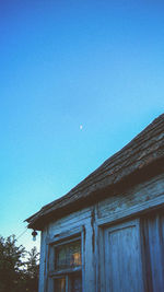 Low angle view of built structure against blue sky