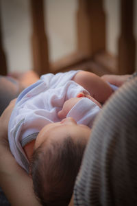 Close-up of woman with baby