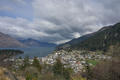 View of queenstown city with lake pukaki and snow mountains.