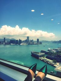 View of cityscape against blue sky