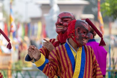 Men wearing masks during event