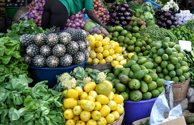 High angle view of fruits and vegetables for sale at market stall