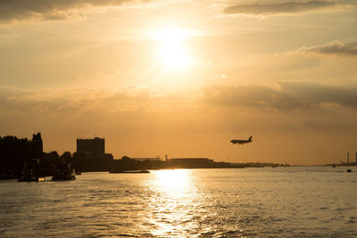 Scenic view of sea against sky during sunset