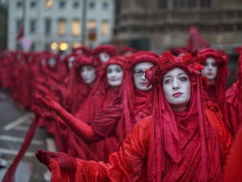 Portrait of red man in city