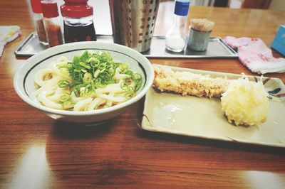 Close-up of food served on table