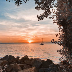 Scenic view of sea against sky during sunset