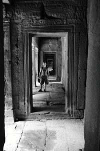 Woman standing at angkor wat