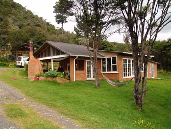 Houses on grassy field