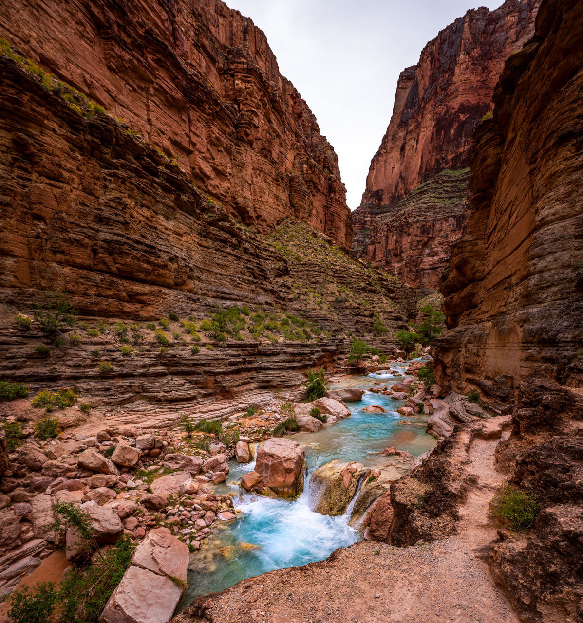 water, rock, rock - object, solid, scenics - nature, rock formation, beauty in nature, nature, non-urban scene, mountain, land, travel destinations, physical geography, day, environment, tranquility, no people, motion, cliff, eroded, outdoors, flowing, flowing water, stream - flowing water, formation