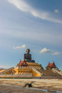 Statue of temple against sky