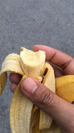 Close-up of hand holding ice cream