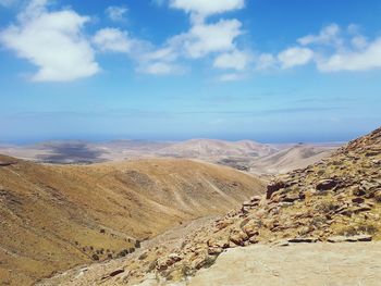 Scenic view of desert against sky