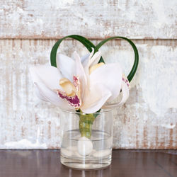 Close-up of white flower vase on table