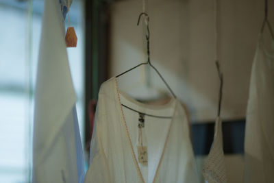 Close-up of clothes hanging at store