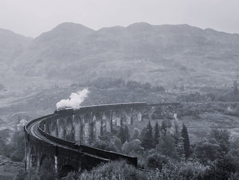 Steam train on a viaduct