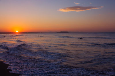 Scenic view of sea against sky during sunset