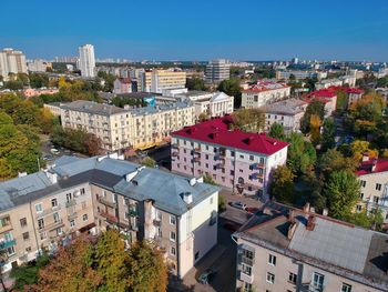 High angle view of buildings in city against clear sky