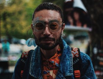 Portrait of smiling man wearing sunglasses