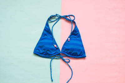High angle view of umbrella against blue background