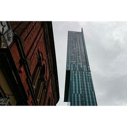 Low angle view of tower against sky