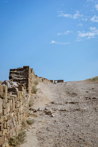 Old ruins against clear blue sky