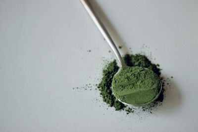 High angle view of bread against white background