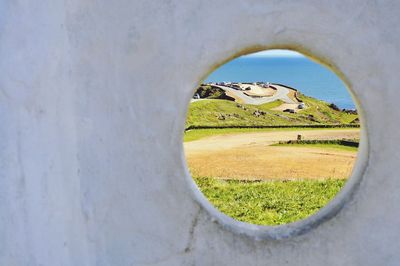 View of landscape seen through window