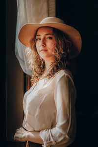 Portrait of woman wearing hat