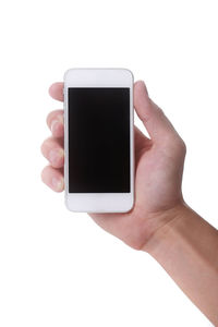 Low section of person using smart phone against white background