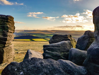 Scenic view of rocks during sunset