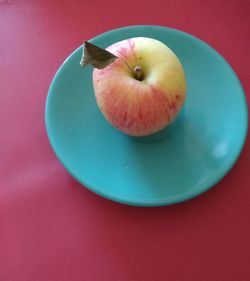 High angle view of apple on table