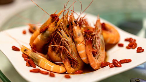 High angle view of prawns in plate on table