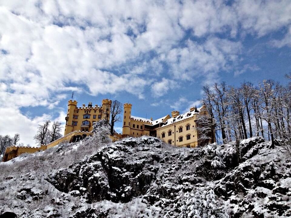 architecture, built structure, sky, cloud - sky, building exterior, abandoned, low angle view, tree, snow, damaged, old, cloudy, day, deterioration, cloud, run-down, history, obsolete, cold temperature, nature