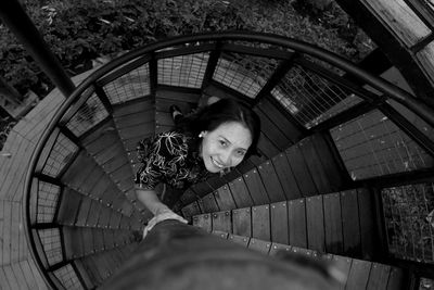 High angle view of woman on staircase