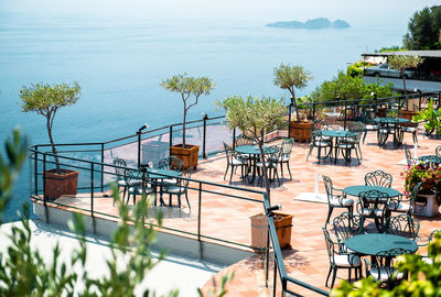 High angle view of swimming pool by sea against sky