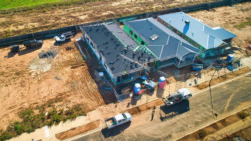 High angle view of people walking on road