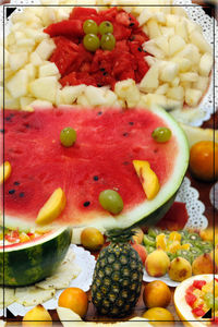 Close-up of chopped fruits in plate