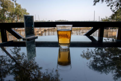 Close-up of beer glass on table