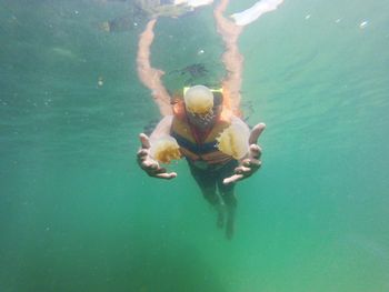 Man swimming in sea