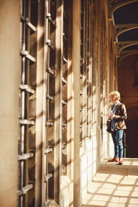 Full length of woman standing outdoors