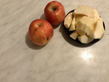 High angle view of apples in bowl on table