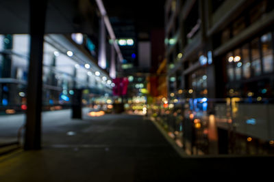 Defocused image of illuminated city at night