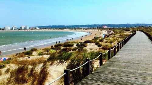 Scenic view of beach against clear sky