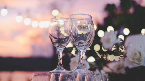 Wine glass at the lake at sunset