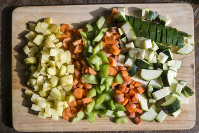 High angle view of chopped vegetables on cutting board