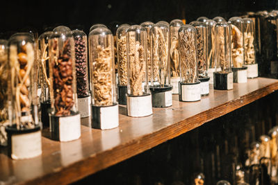 Close-up of bottles for sale