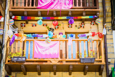 Multi colored umbrellas hanging on table