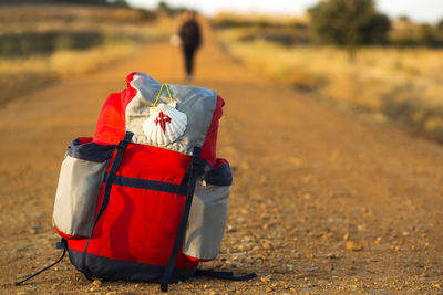 Close-up of backpack on field