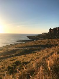 Scenic view of sea against sky during sunset